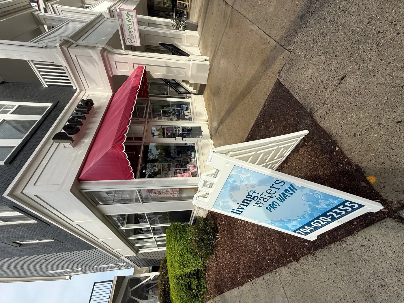 Clean commercial storefront after pressure washing Charlotte NC