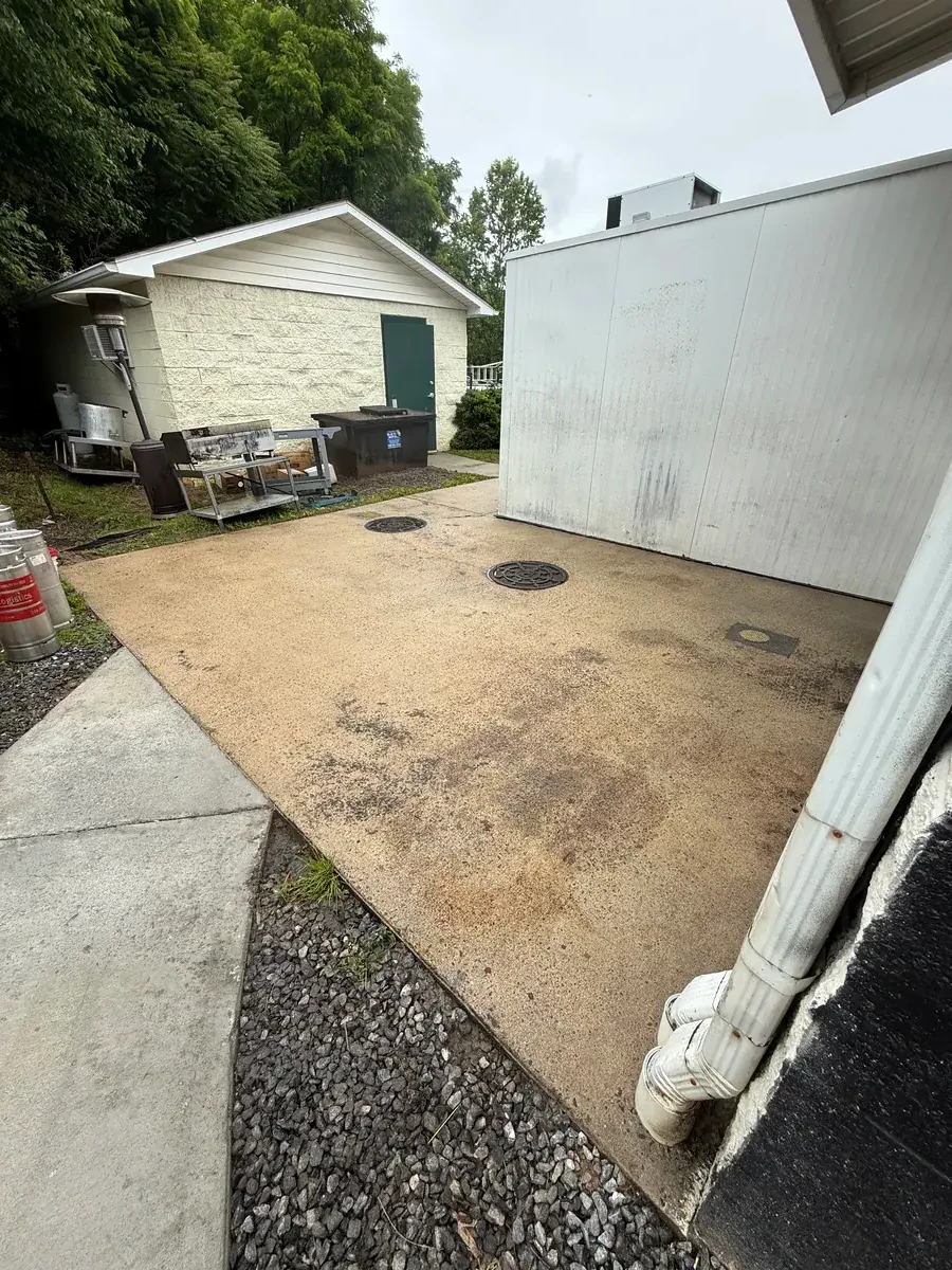 Clean concrete pad after pressure washing Denver NC